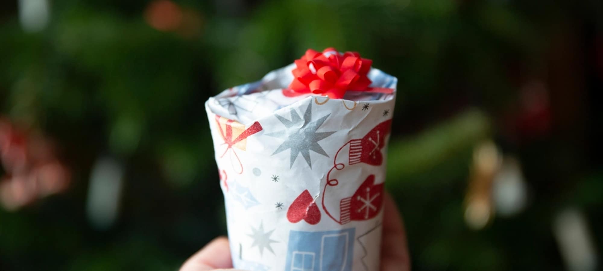 Gifts wrapped in plain paper and tied with ribbon