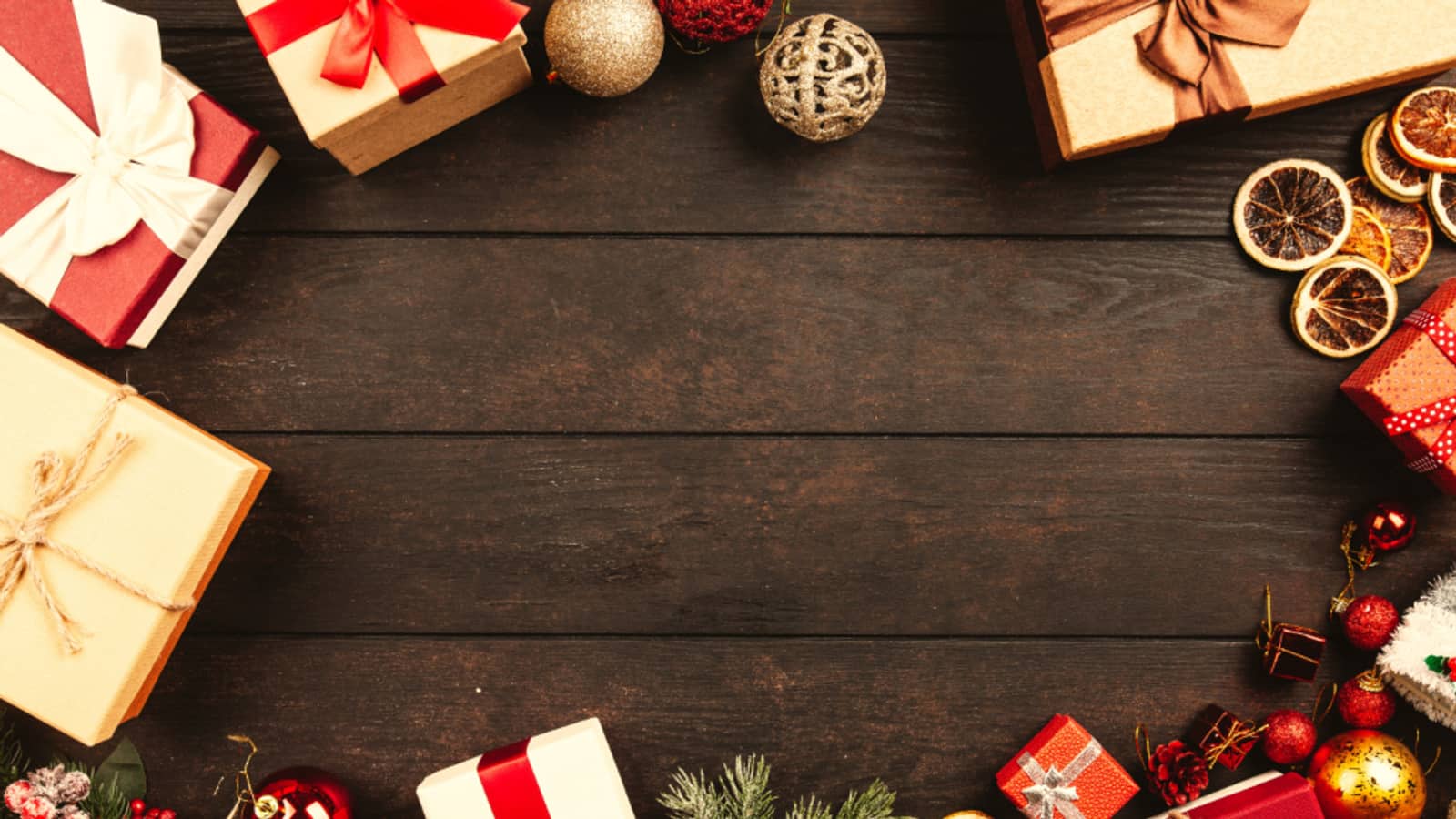 Wrapped gifts and ribbon on a pale table