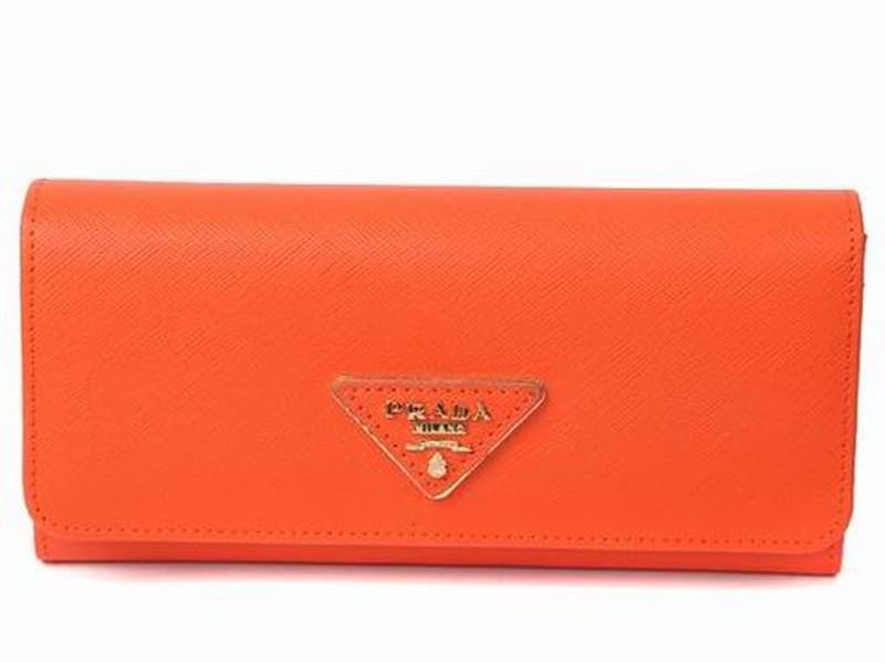 A slim leather wallet on a pale surface